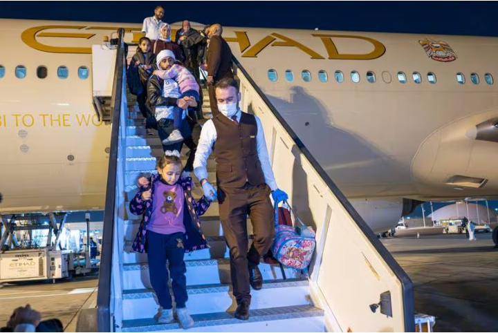 Palestinian patients and their families arrive at Abu Dhabi