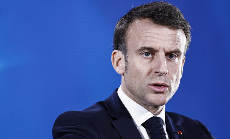 Emmanuel Macron addresses the media at the EU summit in Brussels