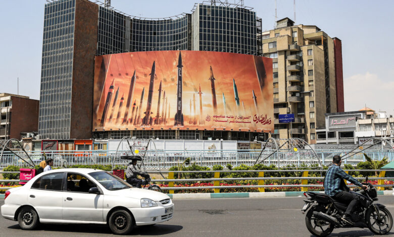 Tehran billboard: Iranian missiles named, Arabic: 'Honest promise,' Persian: 'Israel weaker than spider's web